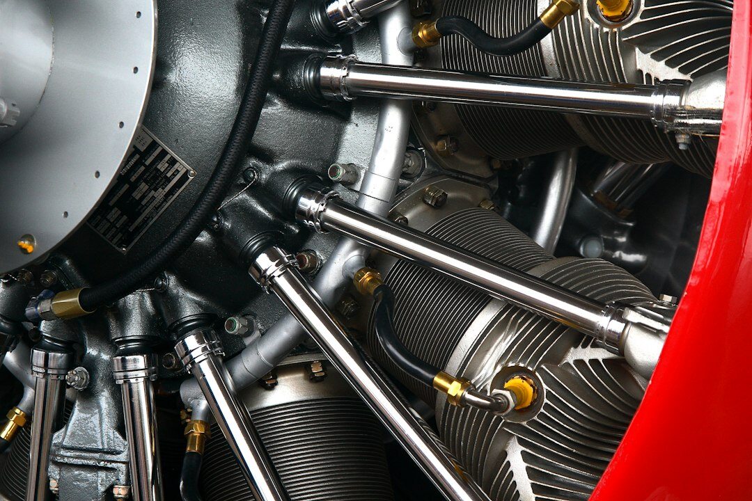 V12 engine bay of a luxury supercar with polished components