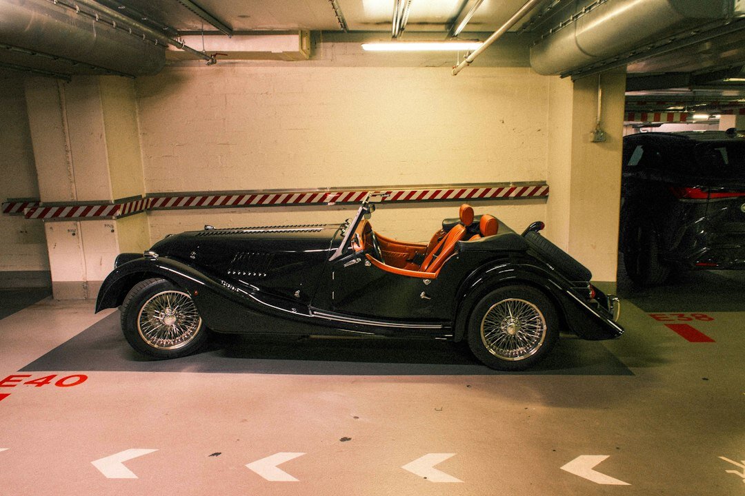 Private underground garage with a curated row of rare automobiles