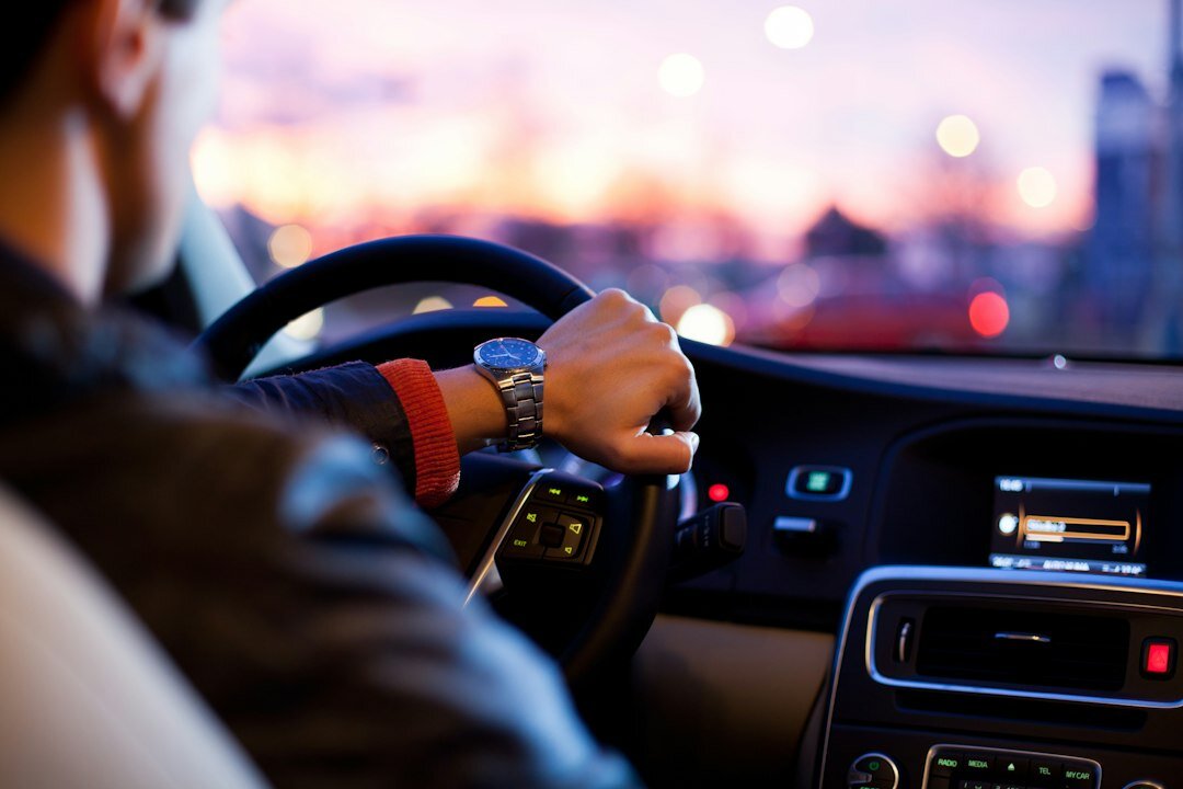 driver using cruise control
